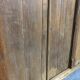 Ancienne porte en bois avec son encadrement