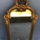 Miroir rocaille bois et stuc doré circa 1950 33x78cm