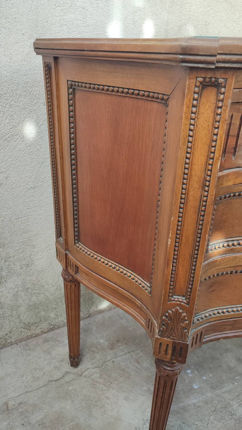 Pair of walnut crossbow chests of drawers