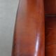 Sheepskin Wingback Chair with Warm Tones and Black Piping