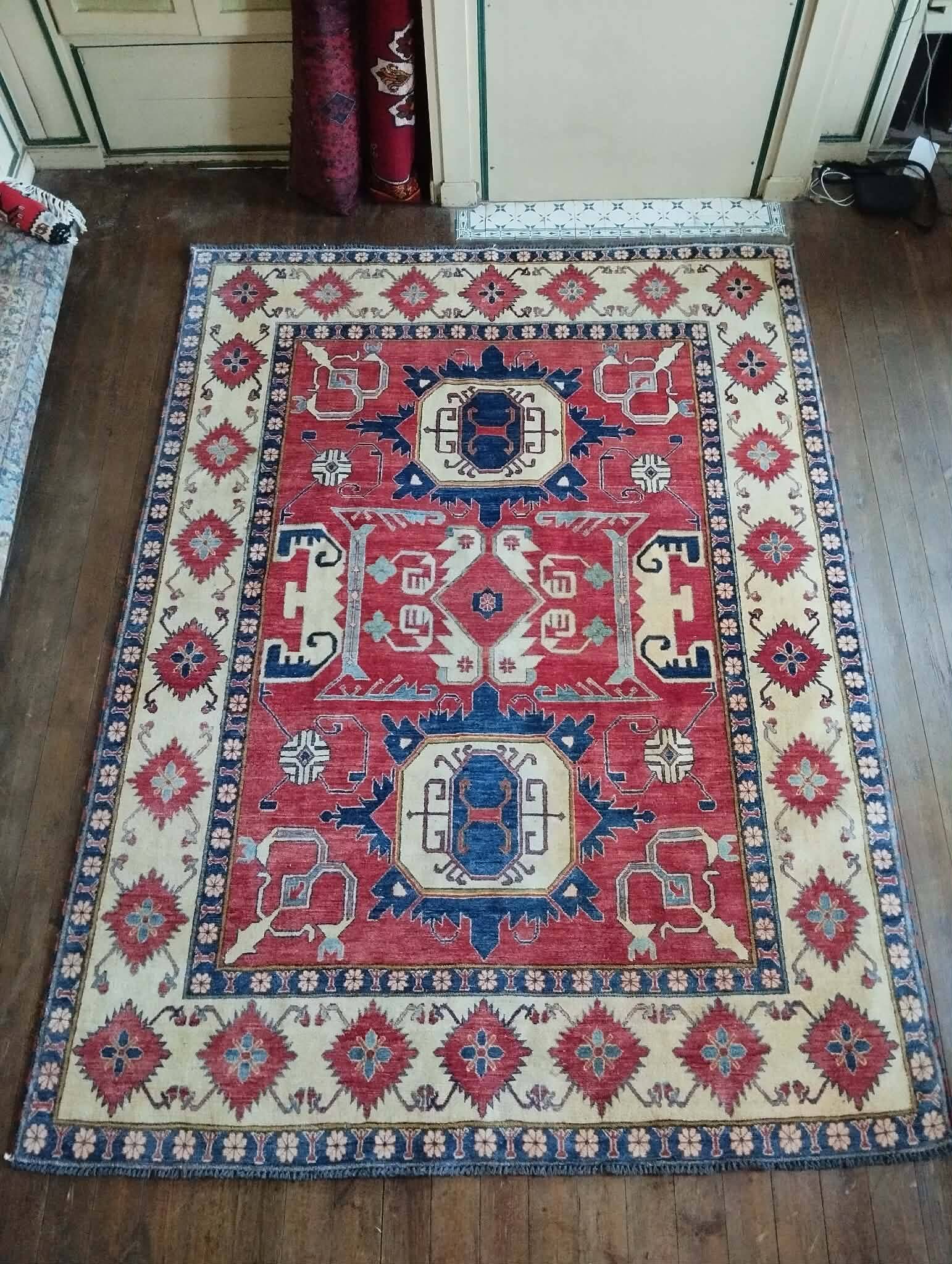 Handmade Pakistani Kazak rug 303x225cm