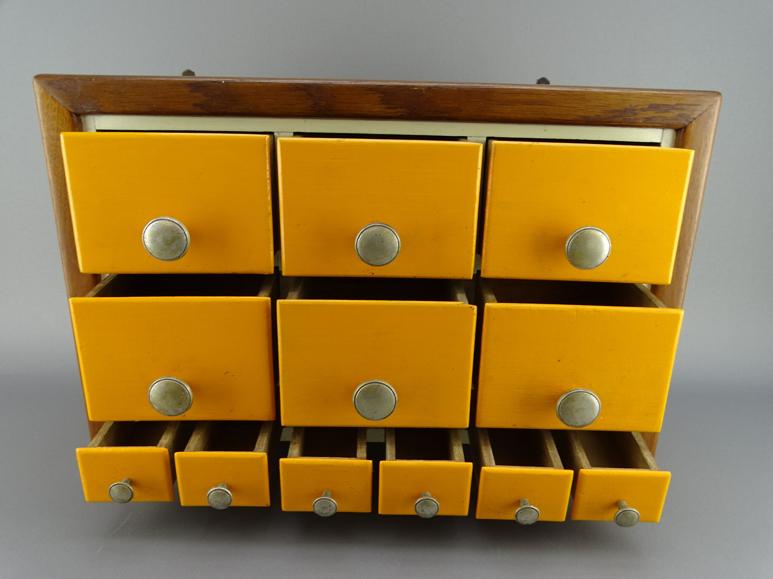Cabinet loom shelf with drawer layette style