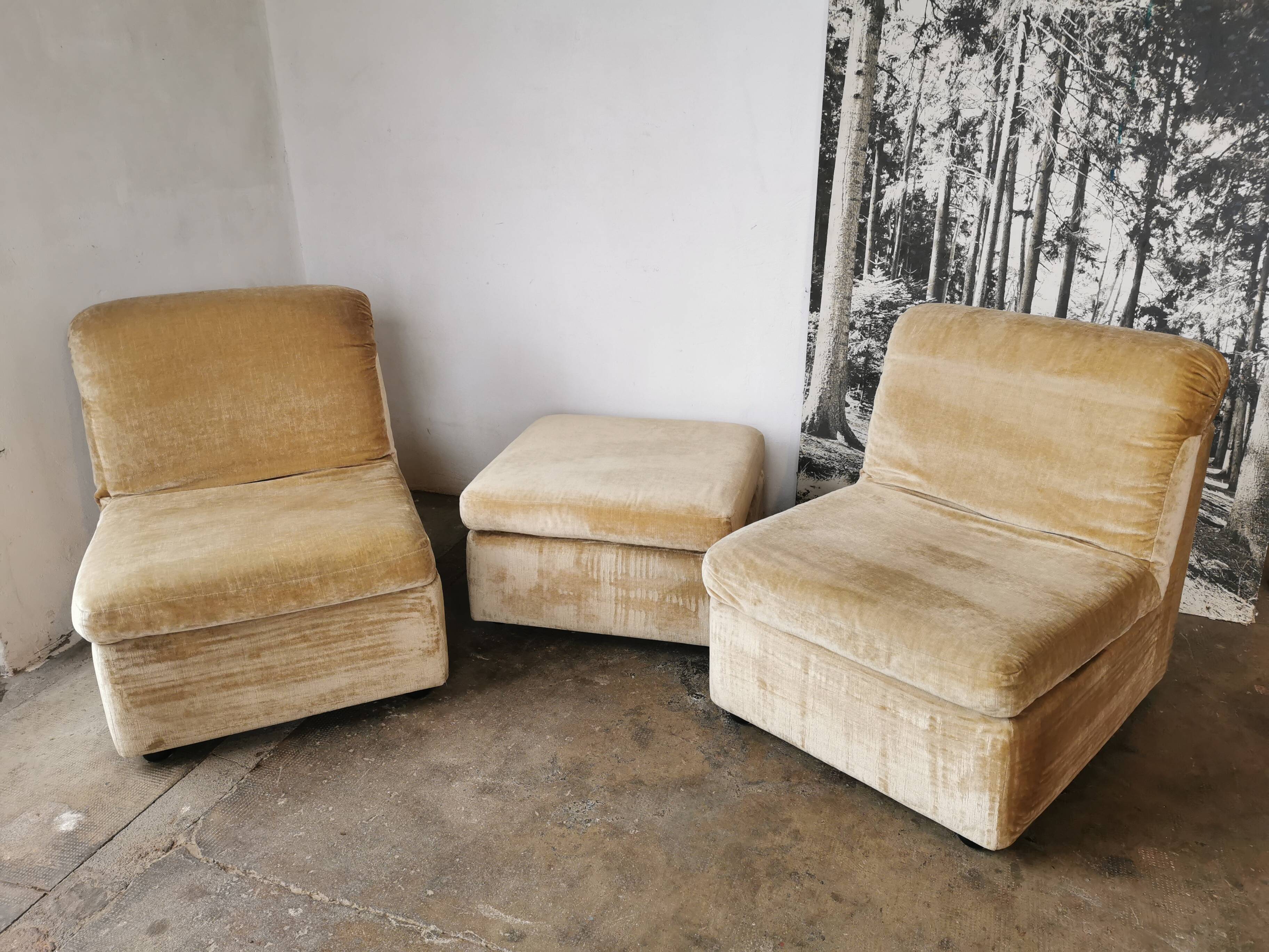 Pair of modular velvet armchairs and ottoman