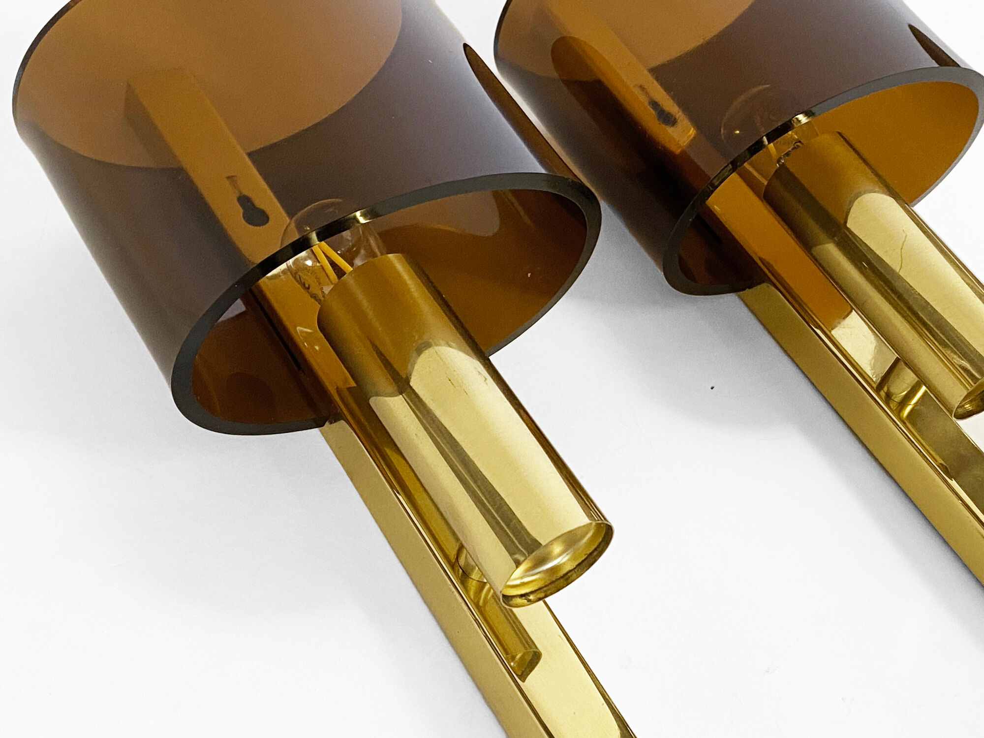 Pair of brass sconces with toned plastic shades, Denmark 1970s