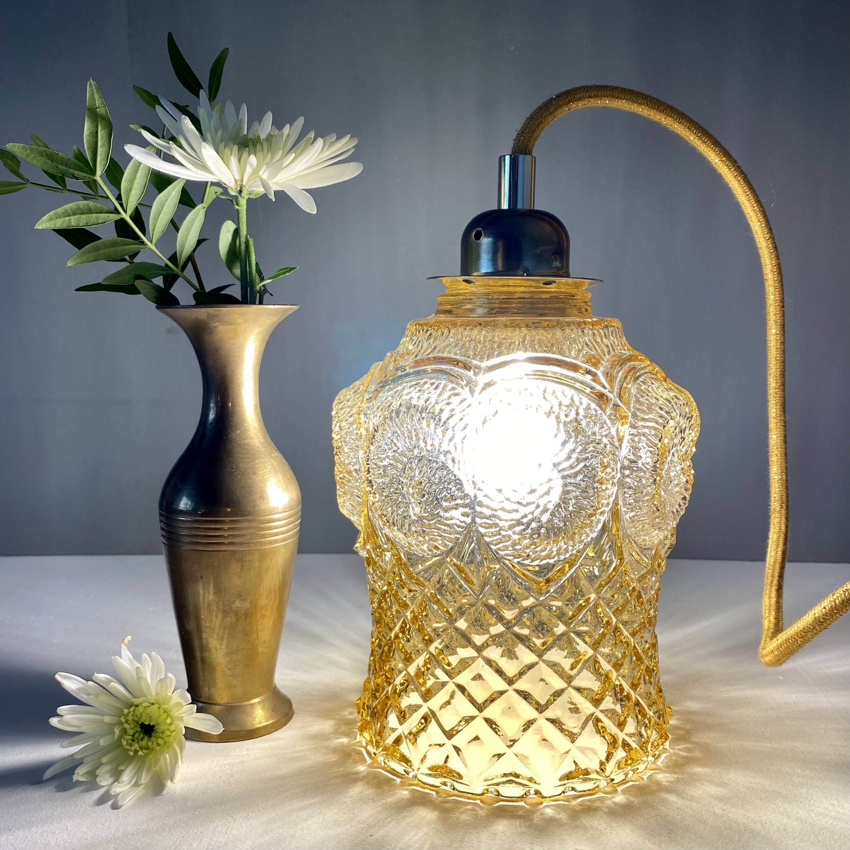 Bladeuse tulipe vintage en verre ambré