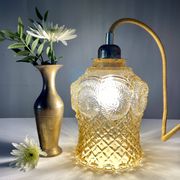 Bladeuse tulipe vintage en verre ambré