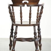 Wooden English antique pub/captain chair from the late 19th century