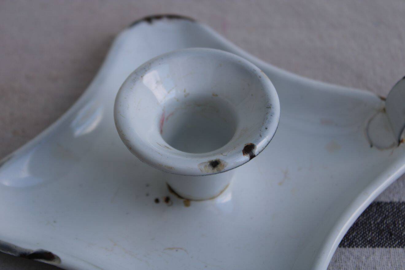 Antique enamel candle holder