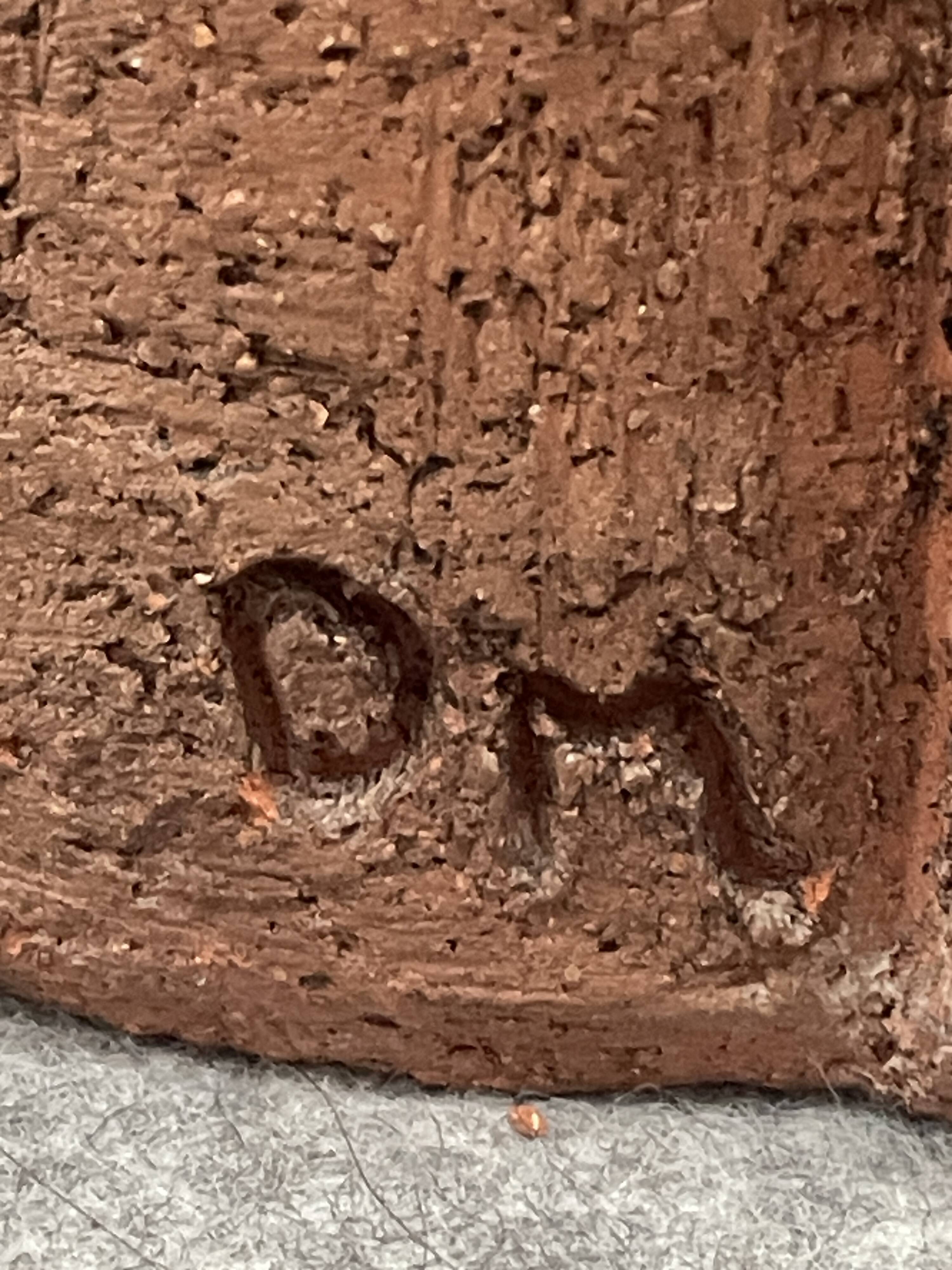 Large chamotte clay lamp in brutalist style, with a plant motif.