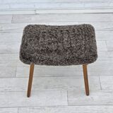 1960s, reupholstered Danish armchair, with stool, genuine sheepskin.