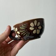 Lot of mismatched Alsatian pottery coffee cups