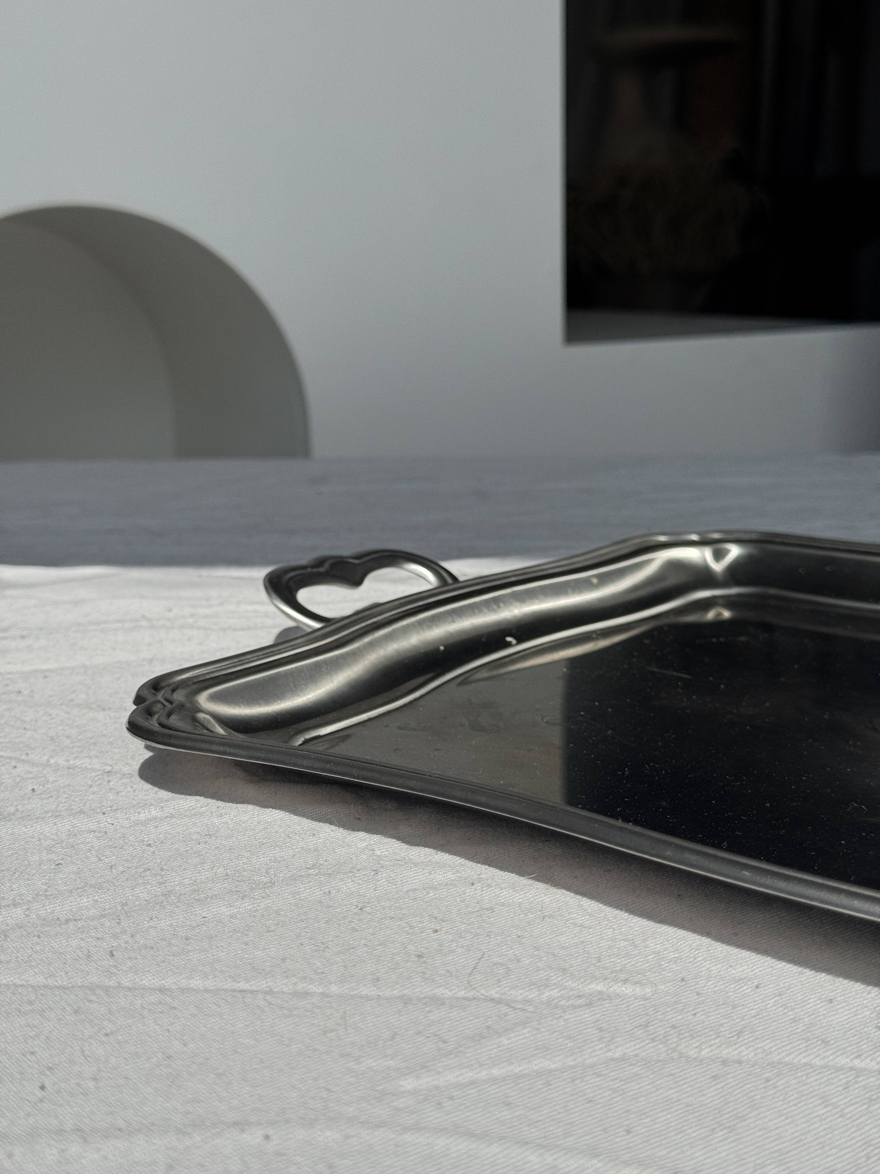 Guy Degrenne silver stainless steel serving tray with an eventful shape