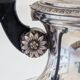 Empire-style silver-plated coffee pot with eagle head spout.