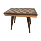 Side table with checkerboard pattern circa 1950