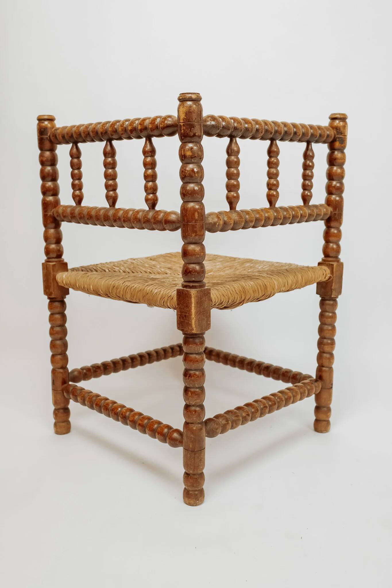 Classic vintage bobbin corner armchair