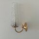 Vintage wall light in brass and etched glass.