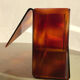 Revised door or document holder in smoked plexiglass from the 1970s