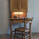 Former campaign secretary's desk in solid pine with a high cupboard.