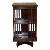 Restored Victorian walnut revolving library.