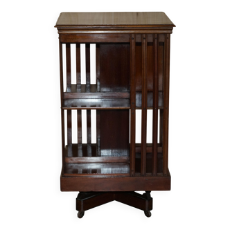 Restored Victorian walnut revolving library.
