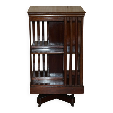 Restored Victorian walnut revolving library.