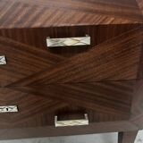 Art Deco chest of drawers with cut sides in mahogany veneer, 20th century
