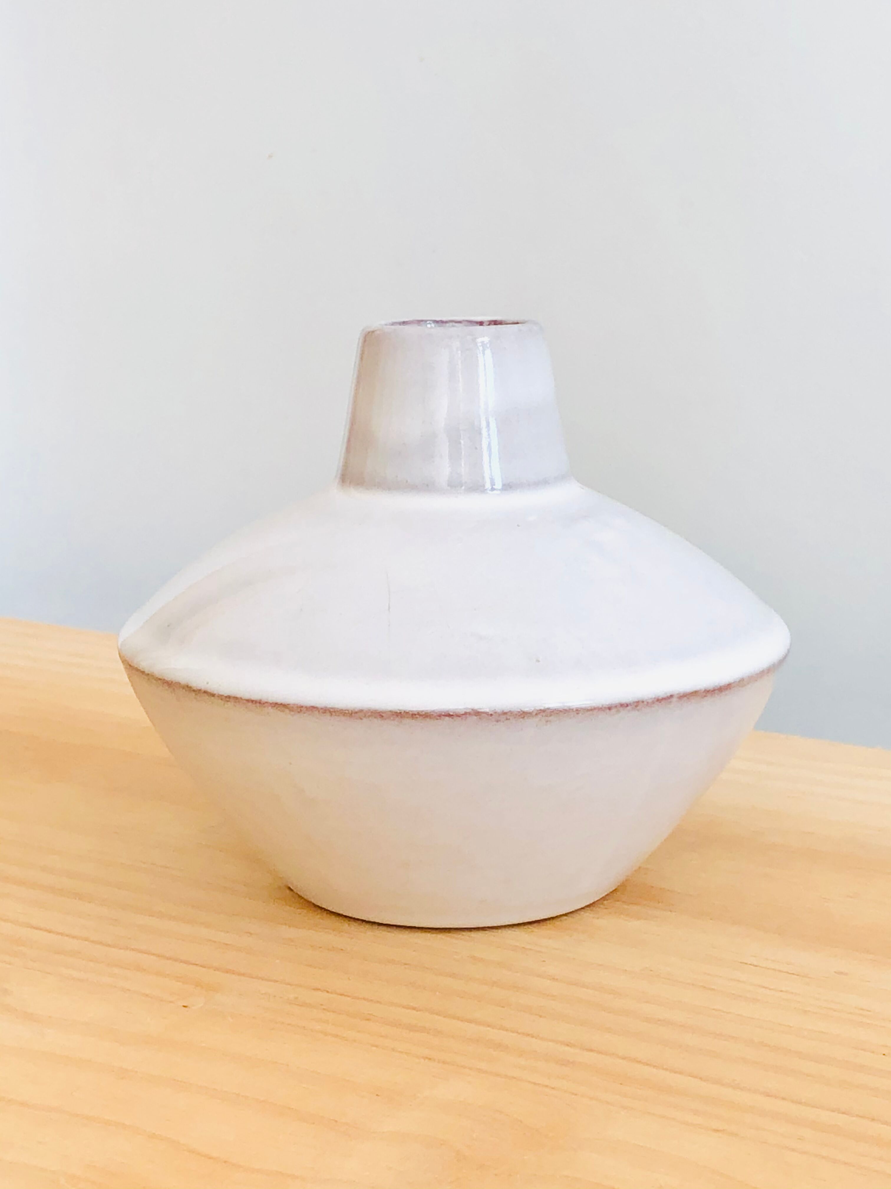 White enamelled terracotta vase