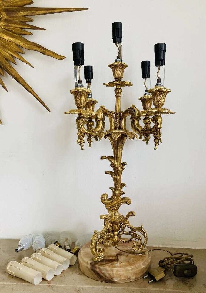 Pair of gilt bronze chandeliers, marble bases.