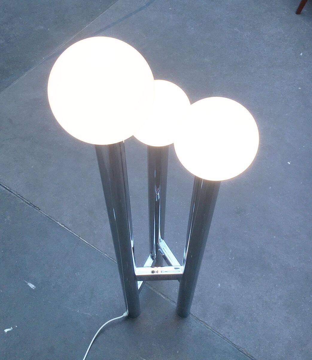 Vintage German floor lamp from the space age of the 1970s in glass and metal.