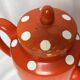 Sarreguemines, two red earthenware jugs with polka dots circa 1940