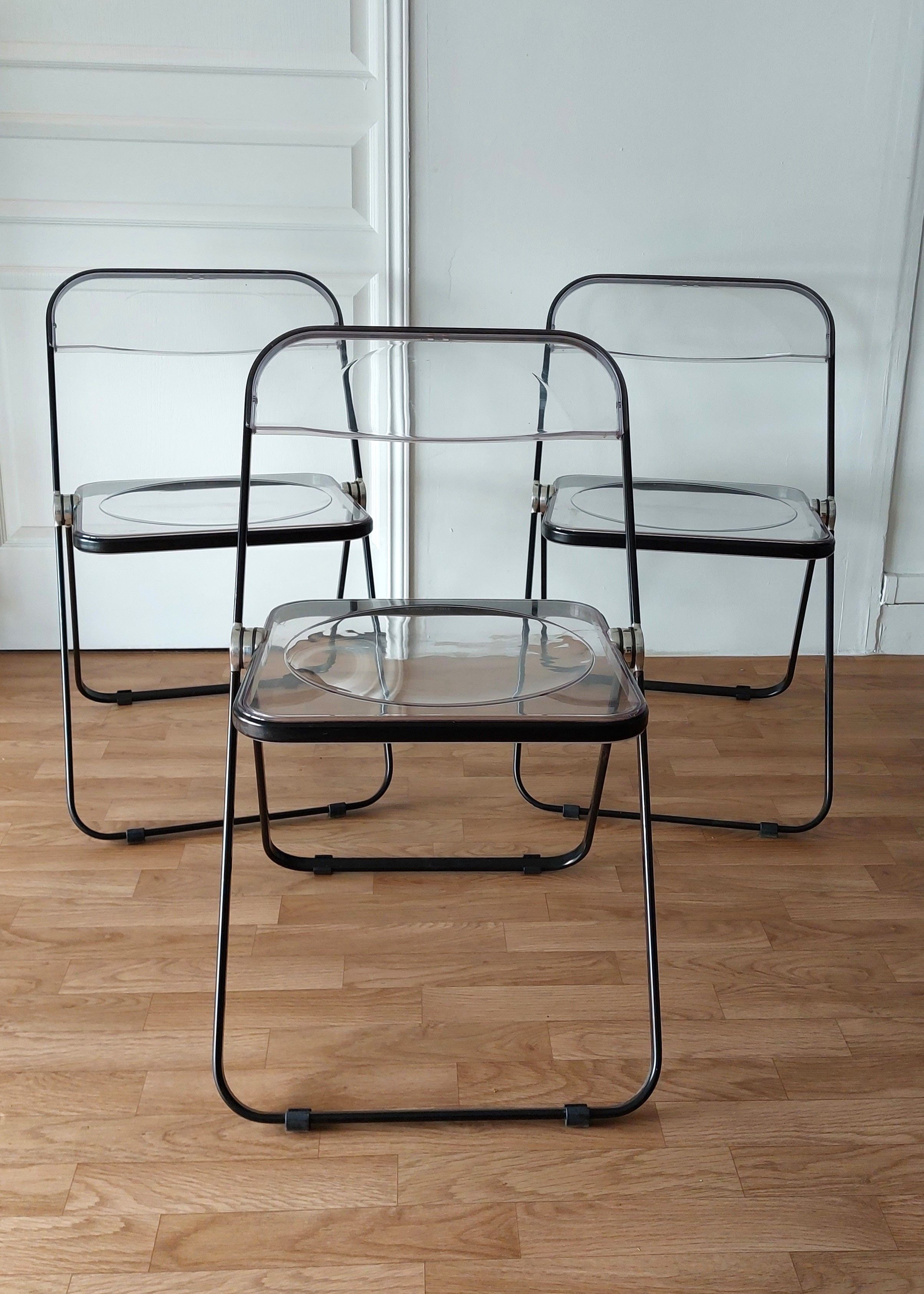 Series of 3 black and transparent Plia chairs Giancalo Piretti for Castelli, 1980.