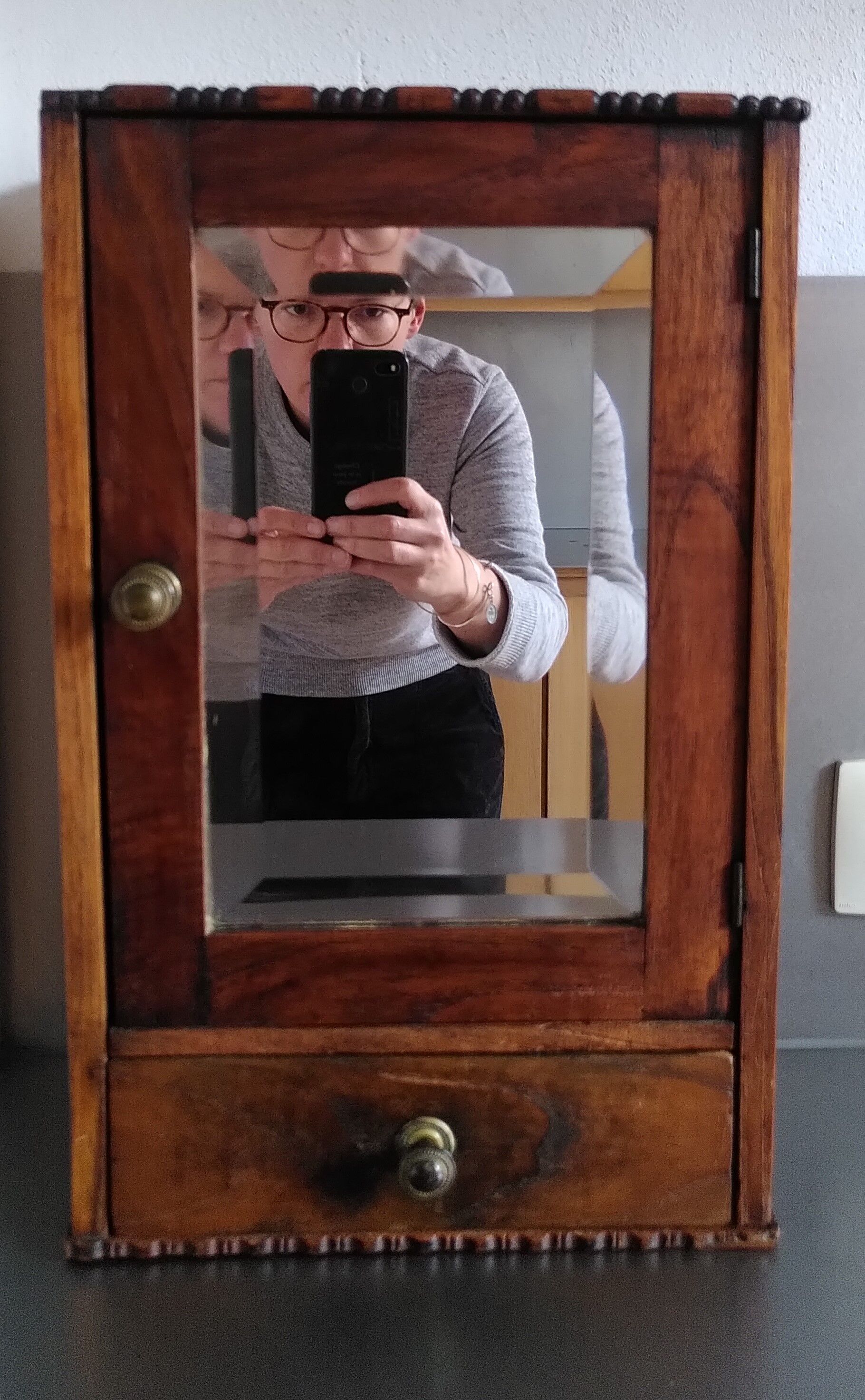 Medicine cabinet with beveled mirror