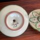 Pair of vintage cave rat candlesticks in glazed terracotta