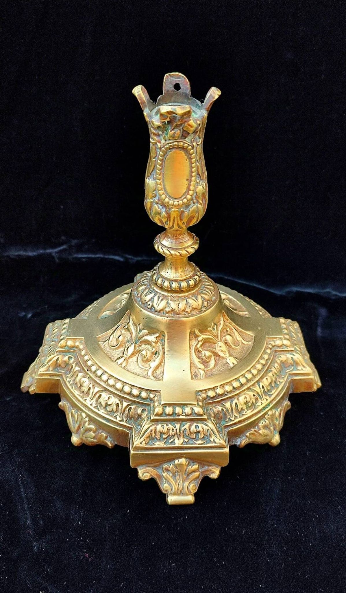 Pair of antique carved bronze candlesticks.