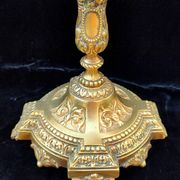 Pair of antique carved bronze candlesticks.
