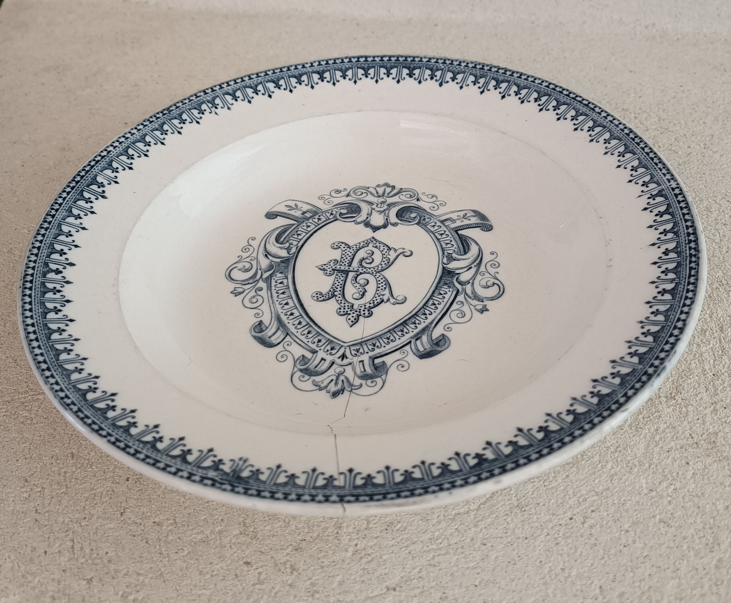 Plate iron earth monogram B