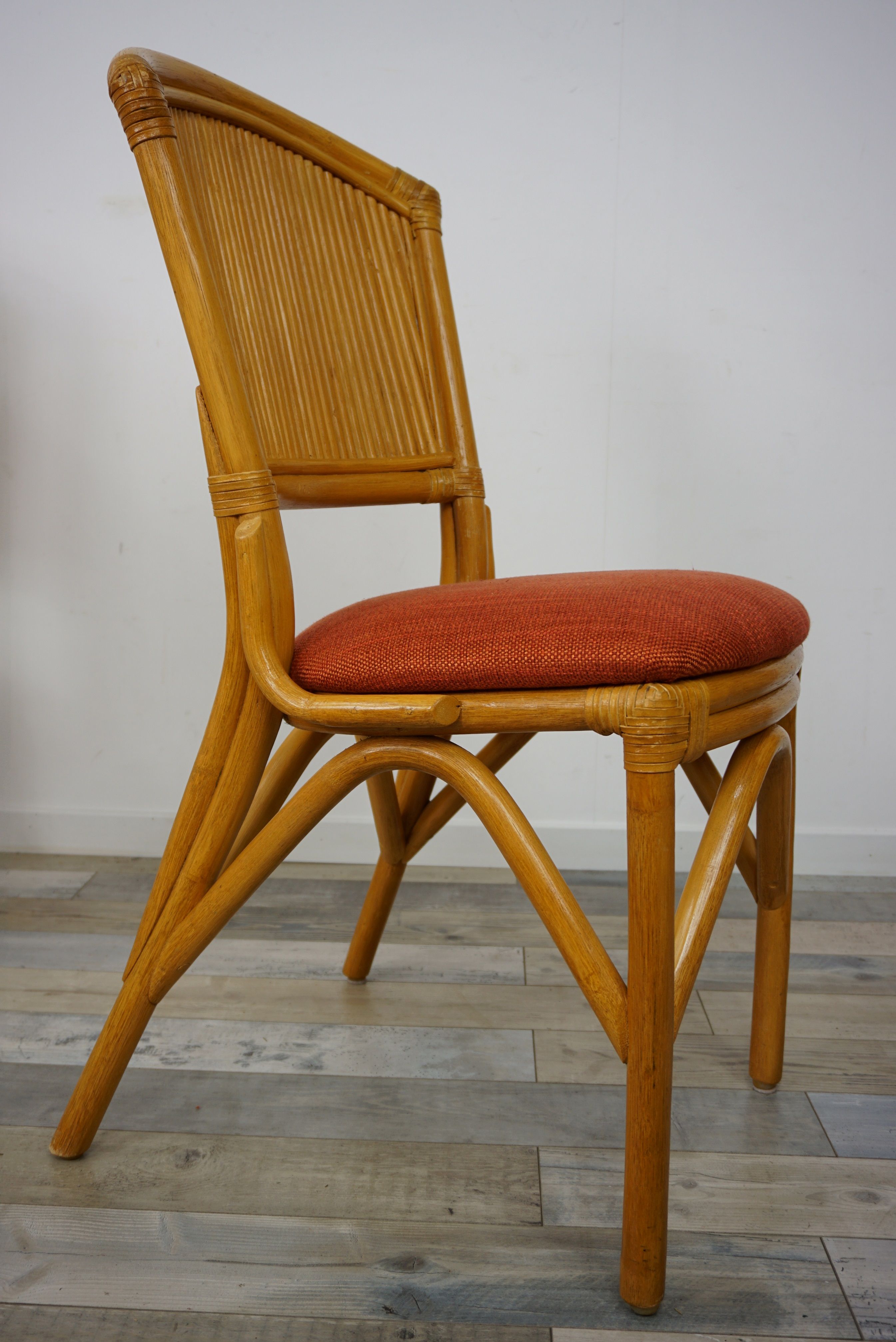Suite of 4 chairs in Italian rattan design from the 60/70
