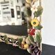 Italian wall mirror in polychrome floral metal, 1950s