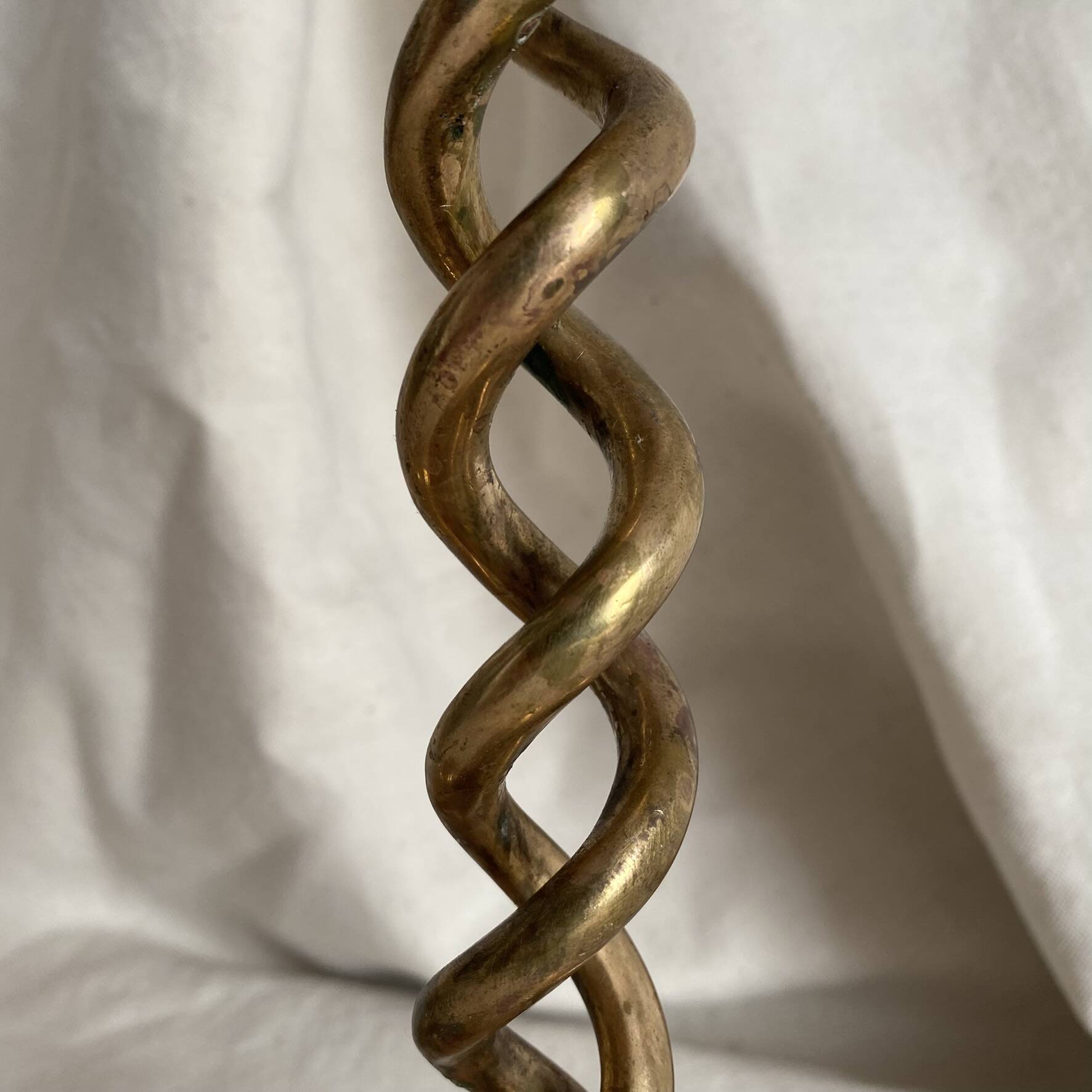 Pair of twisted brass candlesticks