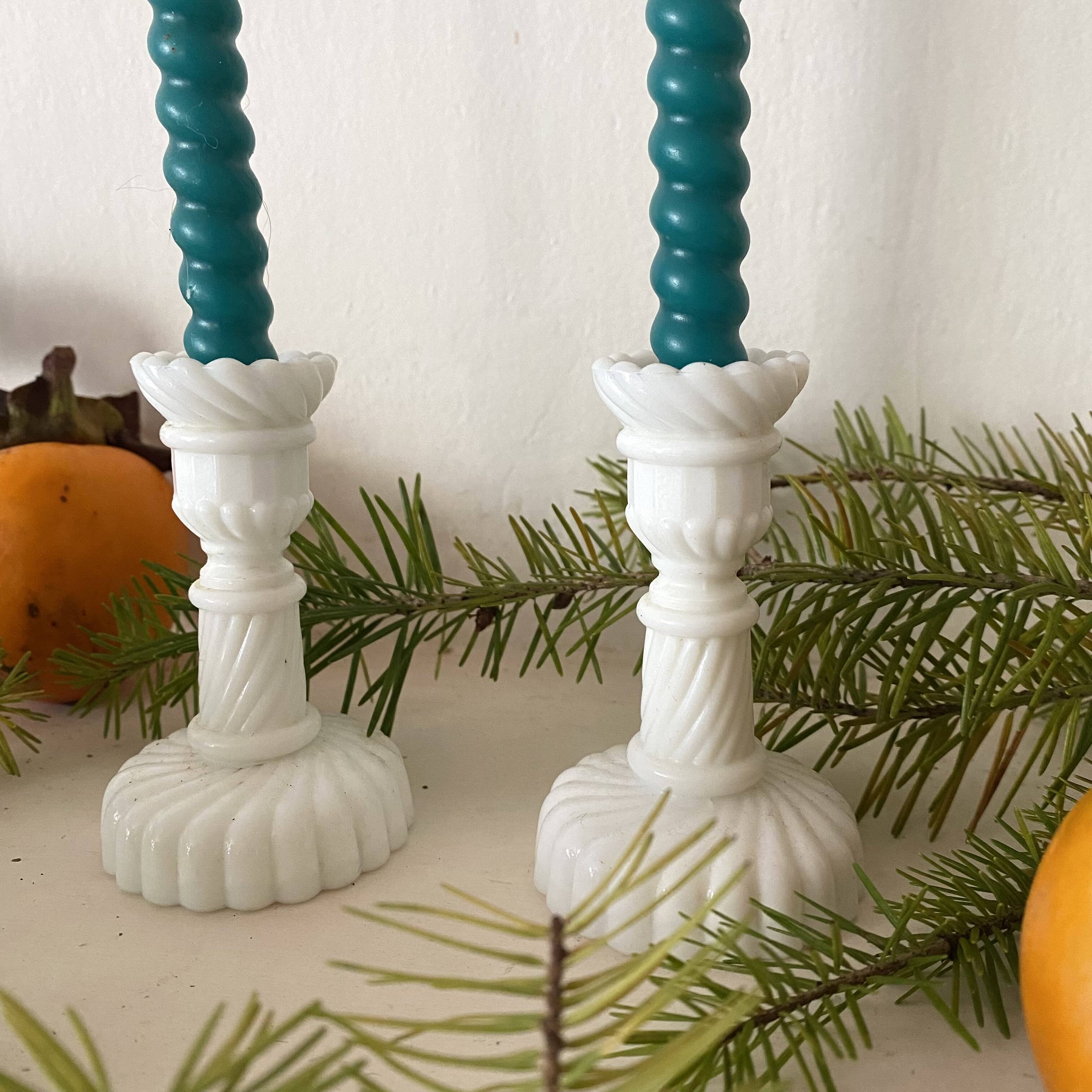 Pair of small white opaline candlesticks