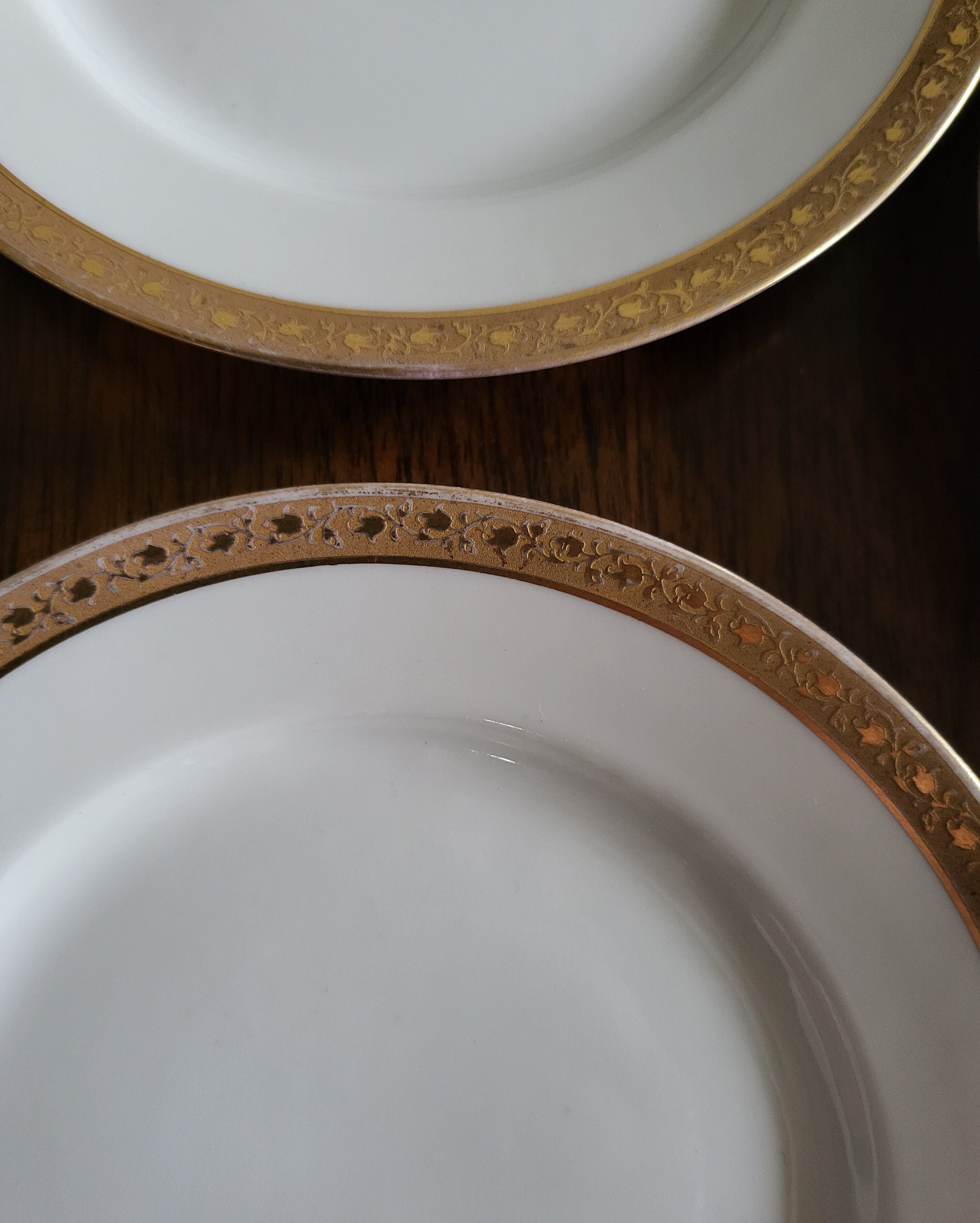 Lot of 8 small porcelain bread plates.