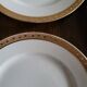 Lot of 8 small porcelain bread plates.