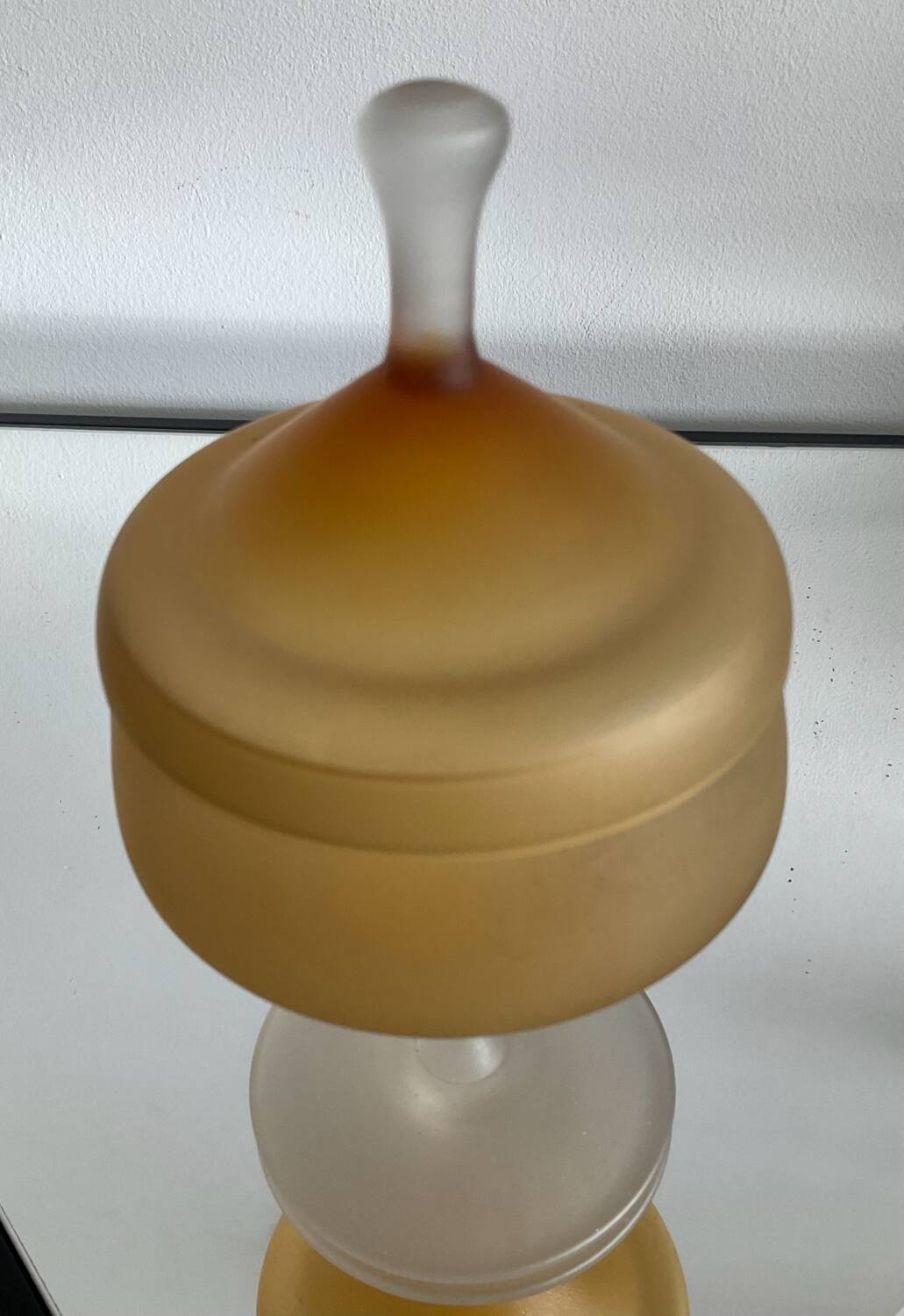 Vintage blown glass candy box on a stand