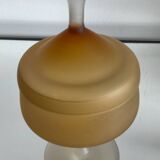 Vintage blown glass candy box on a stand