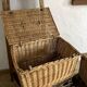 Antique wicker basket with closure and handle