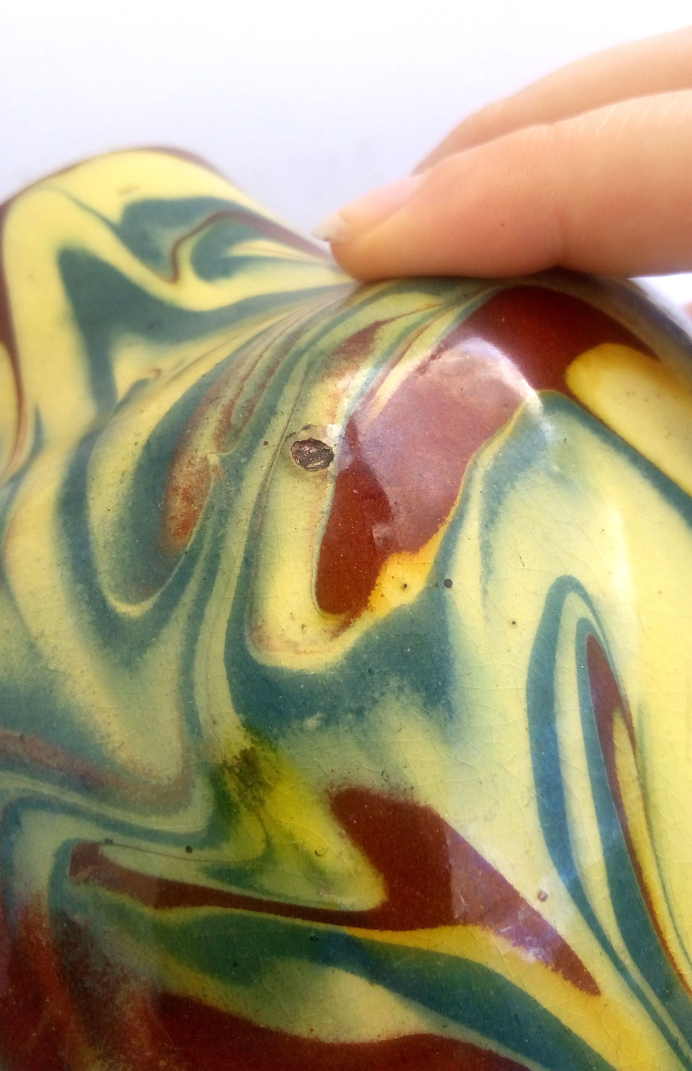 Brown, yellow and green marbled ceramic vase