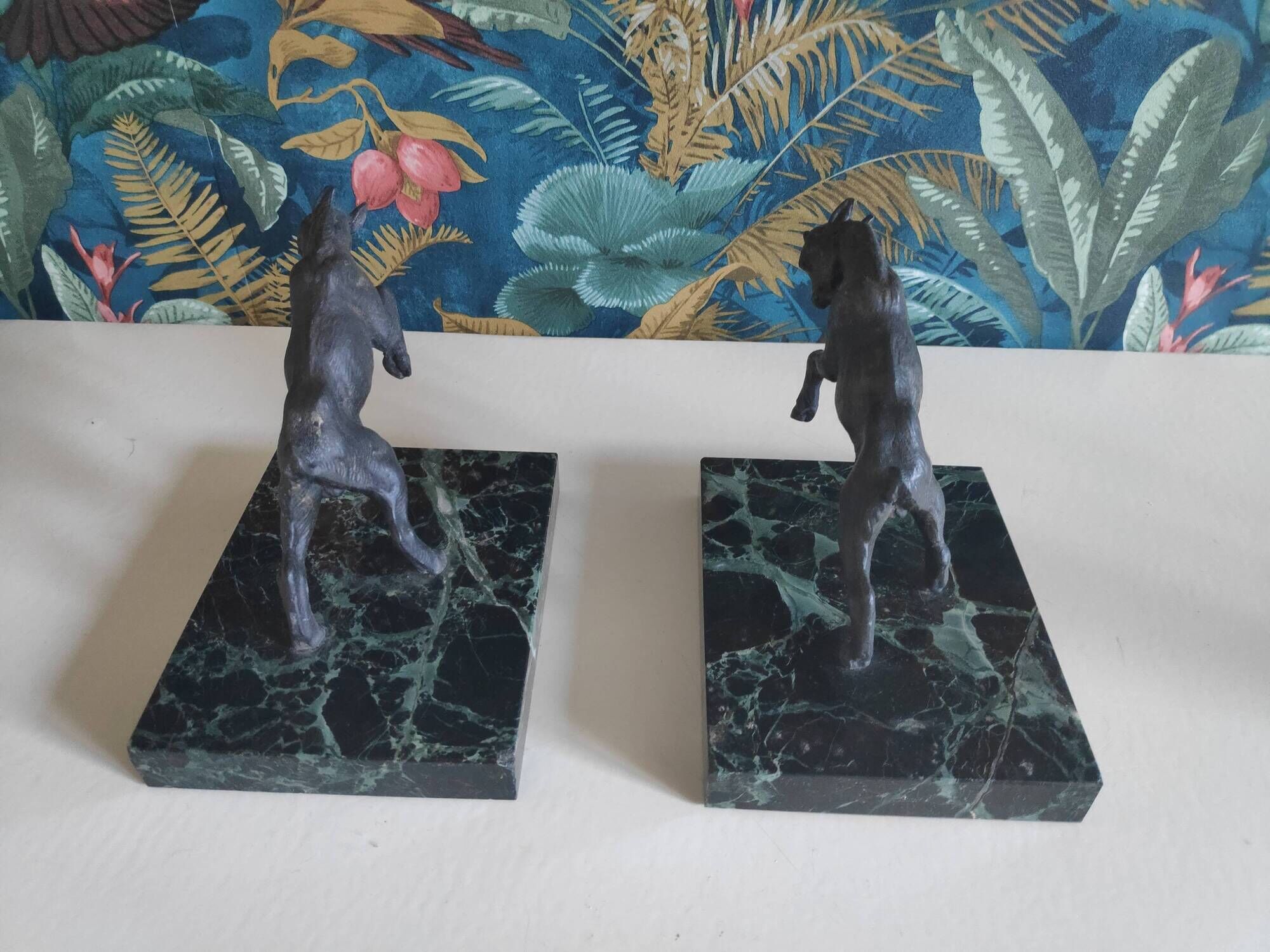 old ibex bookend, base in beautiful black marble veined green