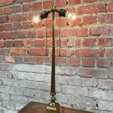 Old brass table lamp with claw feet