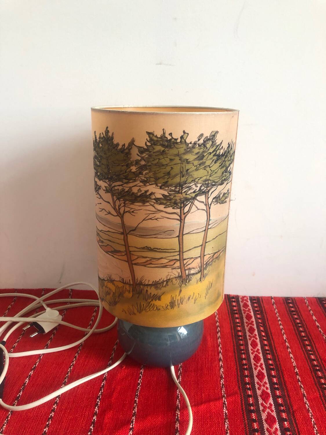 Old ceramic lamp with a silk shade signed Misslen.