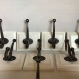 Eight double white wood metal hooks